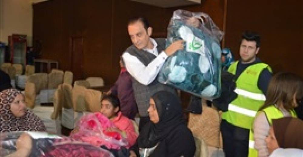 Student convoy to distribute blankets and clothes at Imbaba Polio Institute